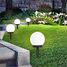 Outdoor LED bulb installed in a secured compound.